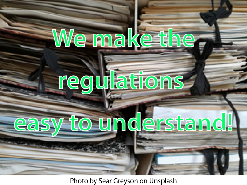 Image of piles of notes with the text, "We make the regulations easy to understand."